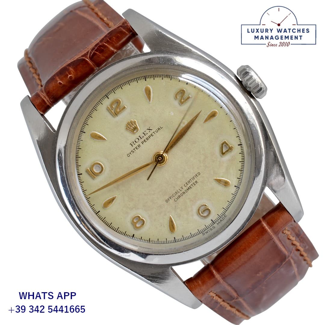 ROLEX VINTAGE MODEL Oyster Perpetual 6028 “Ovettone” Big BubbleBack Ivory dial 1952's